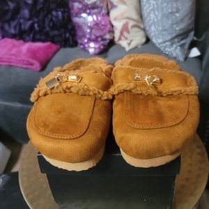 Tan furry slippers